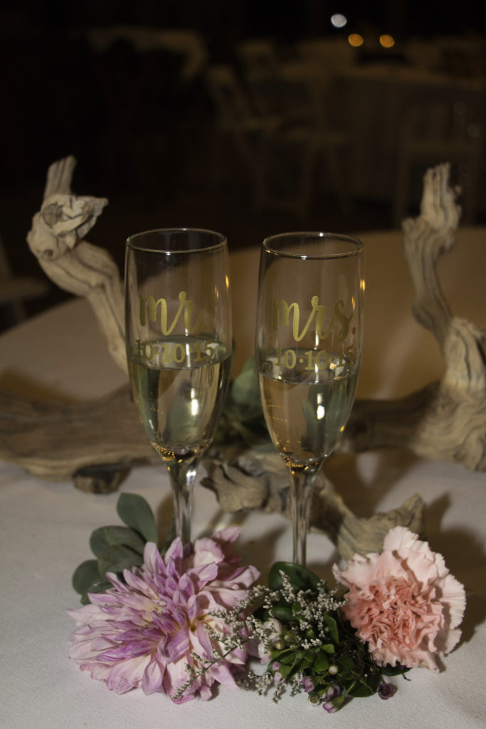 mr and mrs toasting flutes, drift wood wedding tables decor, beach wedding table decor