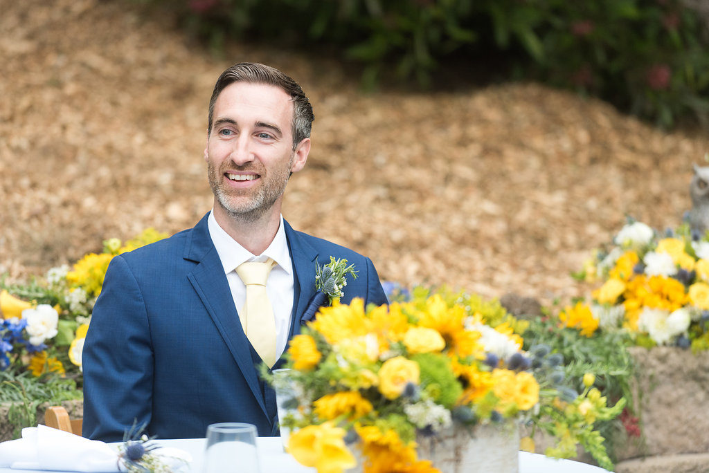 groom, yellow wedding centerpieces
