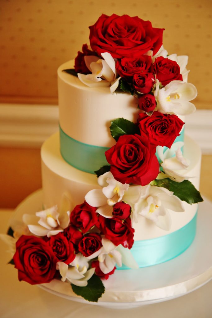 wedding cake with cascading roses