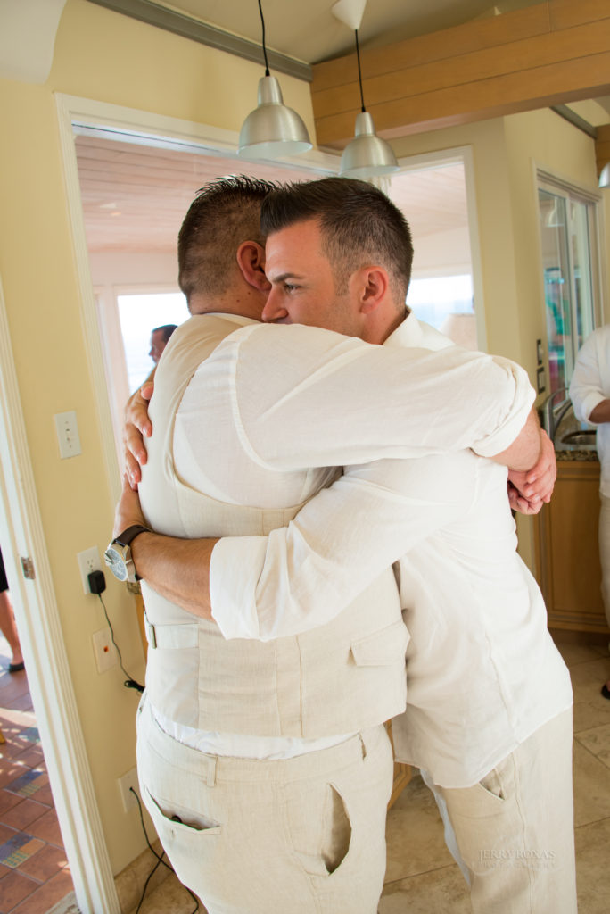 tender moment with groom and groomsman