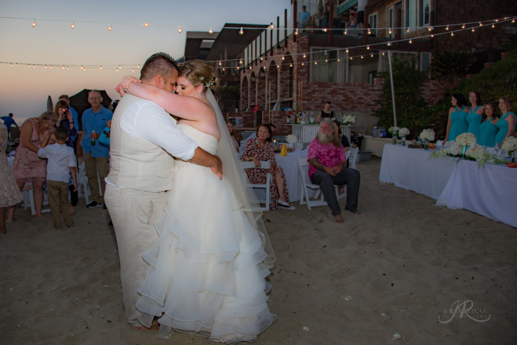 bride and groom dancing, beach wedding