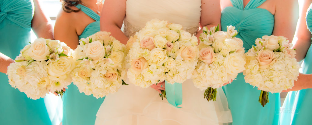 bride and bridesmaids, rose bouquets, blue bridesmaids dresses