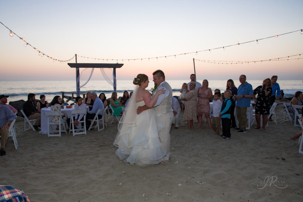 bride and groom first dance, beach wedding, toes in sand wedding