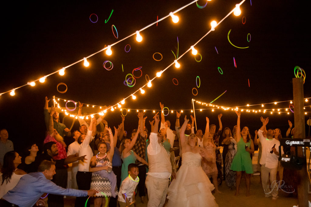 beach wedding, glow necklaces at wedding recpetion. 