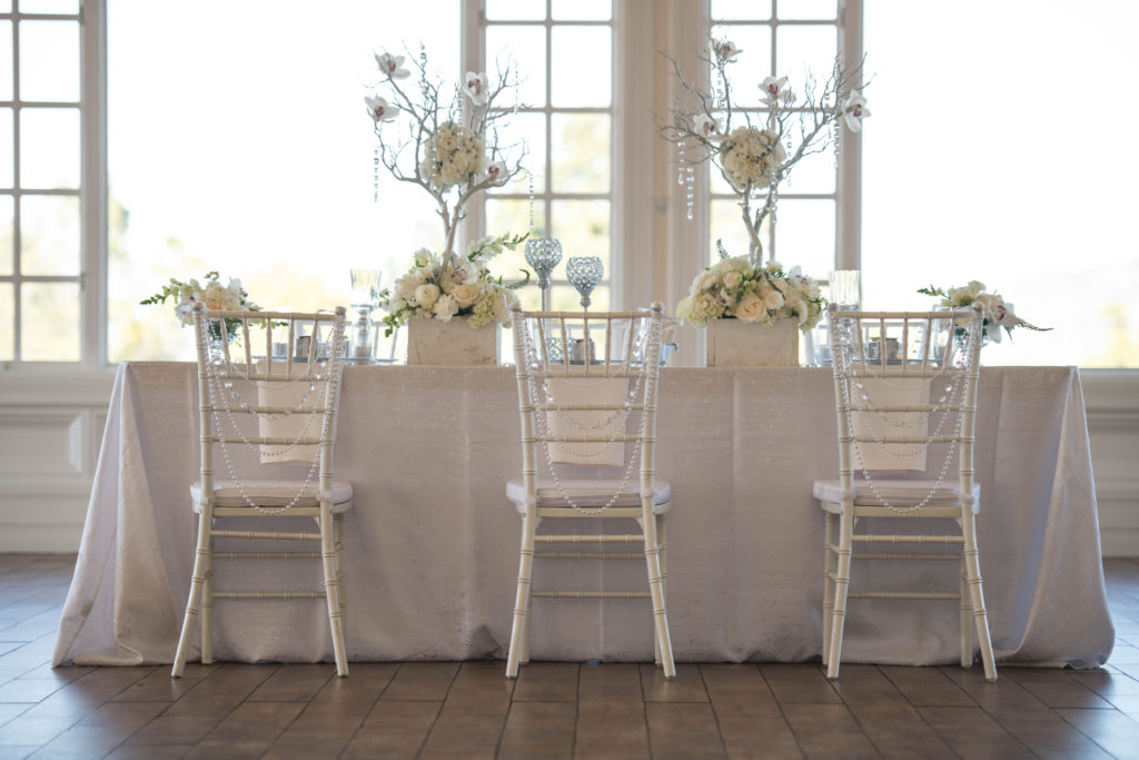 white and silver wedding, white tablescape, orchids, chiavari chairs
